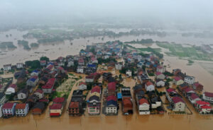 Crop-fields and residential buildings are submerged in floodwater caused by a heavy rainstorm in Zhuzhou, China