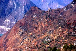 <p>Houses on a mountainside devastated by the recent 6.5-magnitude earthquake, which killed more than 600 people in Ludian county, Yunnan province. (Image by Yang Yong)&nbsp;</p>