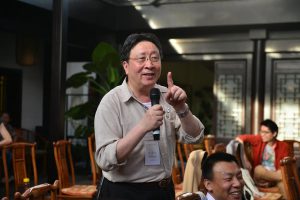 Ye Weijia speaking to a crowd