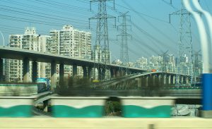 <p>Power lines criss-cross this view of Shanghai apartment blocks. A glut of coal-fired power and cheap power prices amid slackening demand are making it difficult for renewables to get access to China&#39;s power grids. Image by lincolnblues&nbsp;</p>