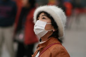 woman wearing a mask in China