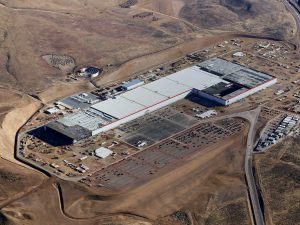 <p>Tesla’s “gigafactory” is driving down costs for lithium ion batteries. A new study suggests that electric vehicles could dominate 70% of road transport by 2050 (Image: Tesla)</p>