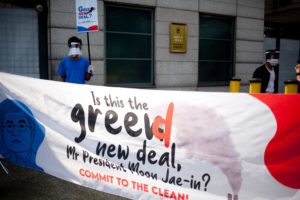 <p>Activists in front of the South Korean Embassy in Jakarta demand President Moon Jae-In withdraws funding from the Jawa 9 and 10 coal-fired power stations in Indonesia. (Image: Alamy)</p>