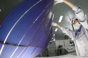 <p>Photovoltaic cells for solar panels in production at a plant in Shanghai, destined for export to Europe (Image: Alamy)</p>
