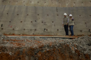 A Chinese and an Ecudorean engineer inspect work at the Chinese-financed Minas-San Francisco hydroelectric project in Sarayunga, Ecuador's Azuay province (Image: Alamy)