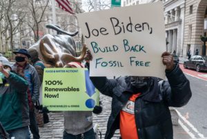 <p>Environmental activists in New York call on Joe Biden to tackle climate change as he takes office as the 46th president of the United States (Image: Alamy) </p>