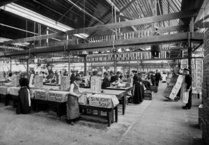 <p>Lever Brothers’ “Sunlight” soap was one of the first soap brands to switch from animal-based fats to palm oil during the industrial era. In this 1897 photo, workers package soap in their factory at Port Sunlight, Liverpool. (Image: Bedford Lemere &amp; Co / Alamy)</p>