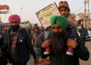 indian farmers' protests, man with daughter on shoulders