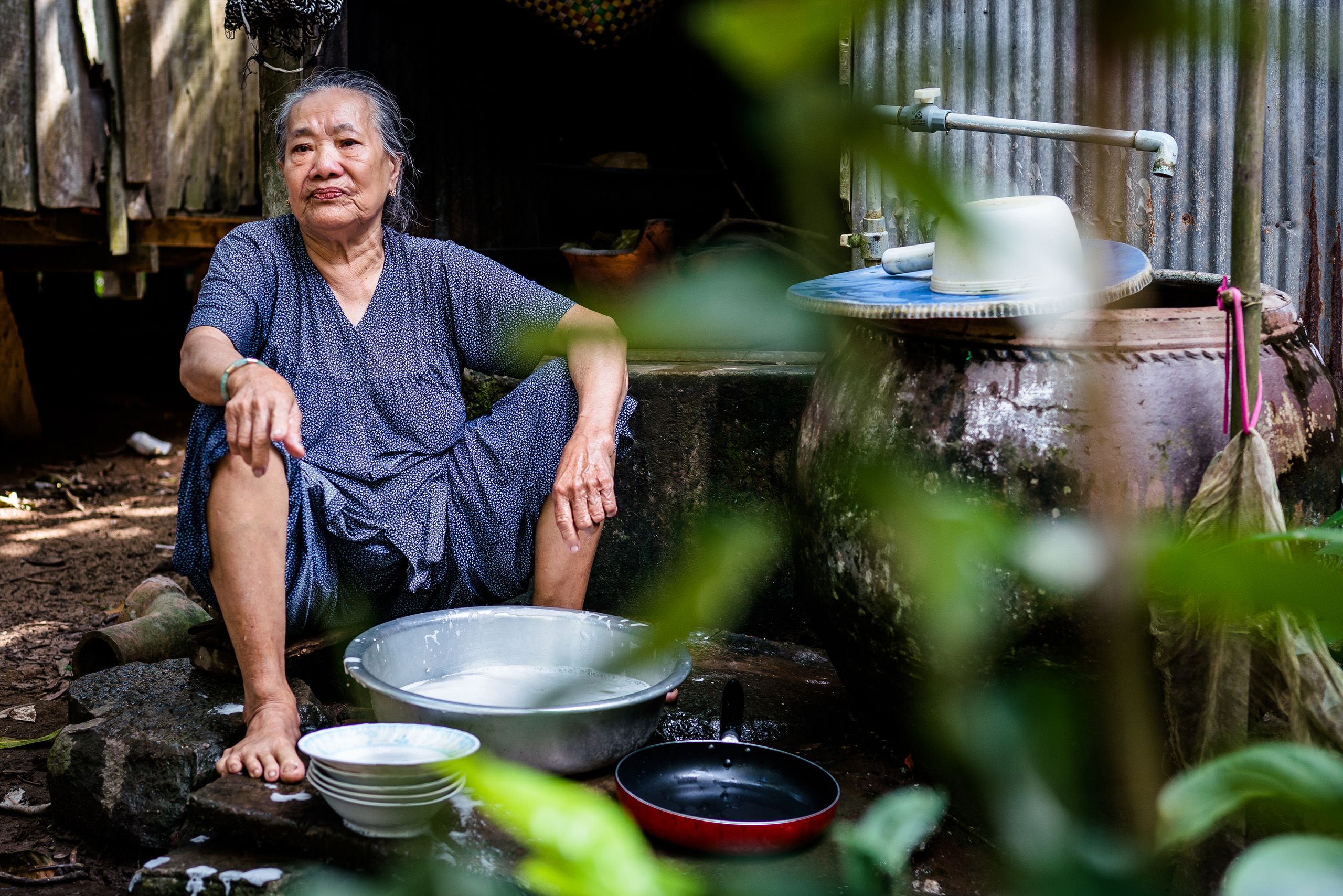 With the river eating away at the edges of Tan Thuan Dong island, residents like Pham Thi Phi are losing not only their homes, but also their orchards