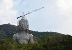 buddha under construction in Lopburi, Thailand