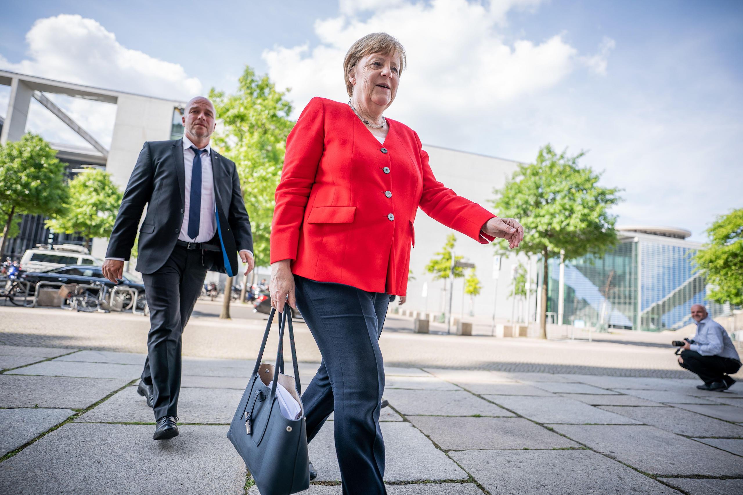 <p>Angela Merkel, who will step down at the upcoming national elections, has been nicknamed “Climate Chancellor” for her long-standing international engagement on emissions cuts (Image: Michael Kappeler / Alamy)</p>