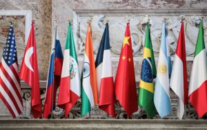 <p>Flags outside the G20 ministerial meeting on environment, climate and energy, held at the Royal Palace of Naples (Image: Sabrina Merolla/Alamy)</p>