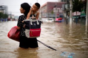 <p>Floodwaters following heavy rainfall in central China&#8217;s Henan province in July this year. The latest IPCC report confirms changes to the climate are happening in all parts of the world. (Image: Aly Song / Alamy)</p>