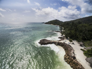 <p>Coastal protection in the Seychelles, one of the countries most vulnerable to the effects of climate change (Image: Kadir van Lohuizen / NOOR via <a href="https://www.flickr.com/photos/unep/27667057434/in/photolist-J9QUgC-JYkFPR-JW5Jq5-J9RuLE-JW68Gq-JW5ggW-JEoCnG-JW5PXN-J9TmYk-J9T694-K6gf9n-JW4nMo-JW4fi5-J9SiHe-JYjJdk-K3dckw-K6fuLF-K3dgc9-JEnB4G-J9RVie-K6eQhM-JYiWYn-JEo5JS-J9Saxg-K6fefa-J9S7nt-JEpsWA-qh9DTc-qhScyP-q3wvvE-pn6Pk5-EzJ9zi-NZs5J9-EzJ8sZ-AH3wt1-C1mceY-BdxPdg-BdxL1p-CaWoJc-BZLXmN-qnkJbi-q65x3F-qkeLTb-pqwK41-qgNYxw-q66ScP-pqwEQ1-qnsobW-pqwFMb-qiV3ii">Flickr</a>, <a href="https://creativecommons.org/licenses/by-nc-sa/2.0/">CC BY-NC-SA 2.0</a>)</p>