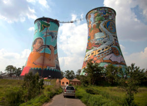 <p>Decommissioned cooling towers of the Orlando coal power station in Soweto, South Africa. Like China, the country is heavily dependent on coal for its electricity supply and faces the challenge of ensuring the switch to renewables is fair for workers in the fossil fuel industry. (Image: Peter Schickert/Alamy)</p>