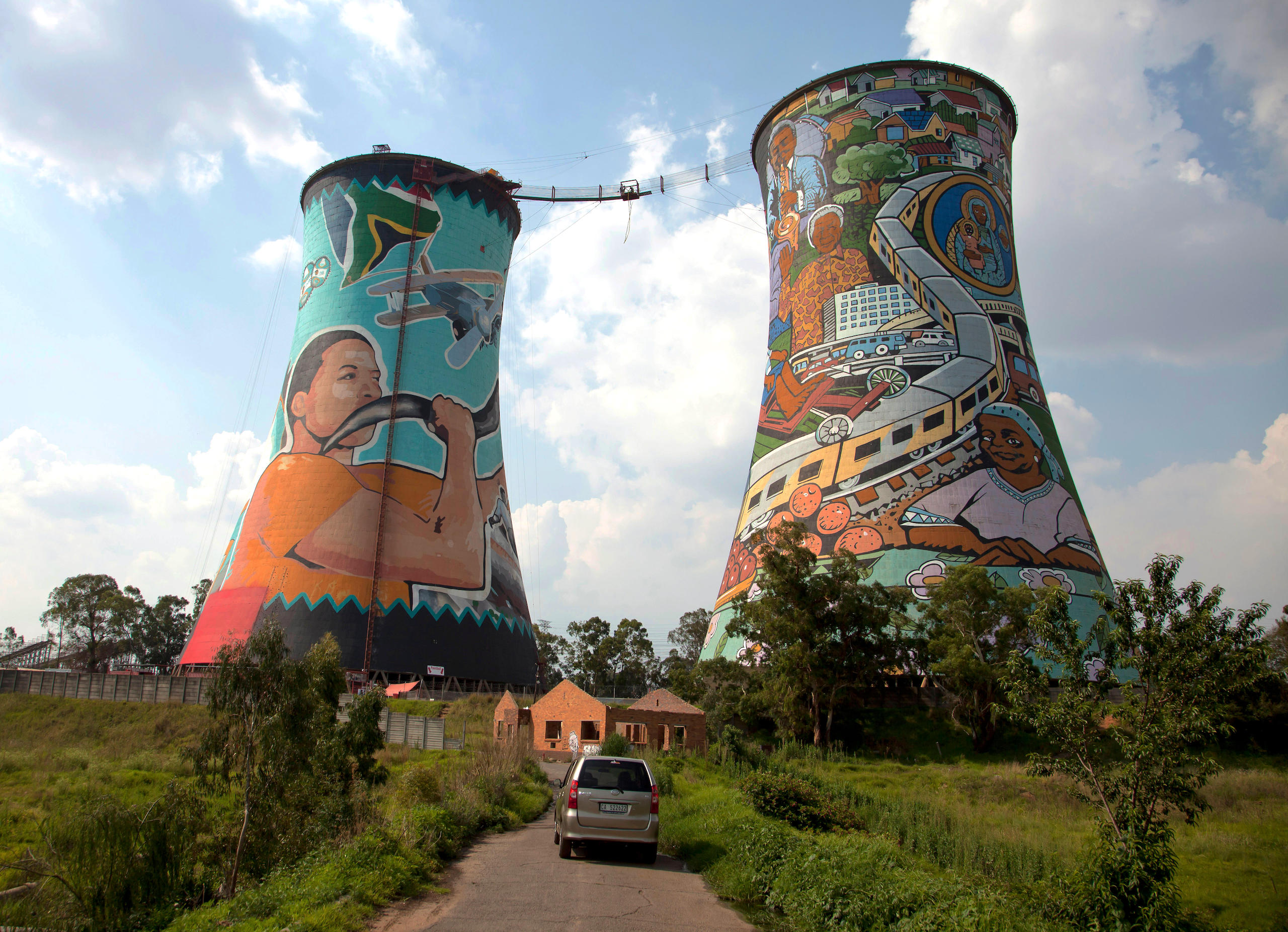 Decommissioned cooling towers of the Orlando coal power station in Soweto, South Africa. Like China, the country is heavily dependent on coal for its electricity supply and faces the challenge of ensuring the switch to renewables is fair for workers in the fossil fuel industry. (Image: Peter Schickert/Alamy)