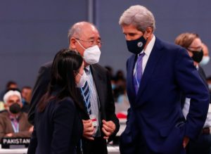<p>US special climate envoy, John Kerry, speaks with the Chinese special climate envoy Xie Zhenhua at COP26 in Glasgow. (Image: Han Yan / Alamy)</p>