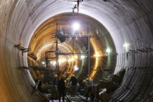 <p>Chinese workers labour in the tunnel of a canal through the Yellow River in the middle route of the South-to-North Water Diversion Project, Zhengzhou, Henan province. More than 300 new water infrastructure projects were announced between 2014 and 2020. (Image: Alamy)</p>