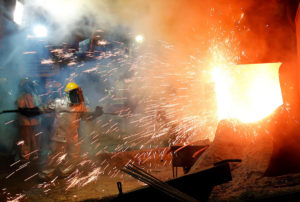 Sparks fly from a ferronickel smelter in a nickel processing plant in Southeast Sulawaesi, Indonesia