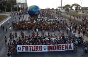 Indigenous people march during a protest against Brazil's President Jair Bolsonaro and for land demarcation in Brasilia, Brazil