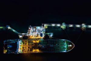 shipping green fuels nighttime aerial photograph