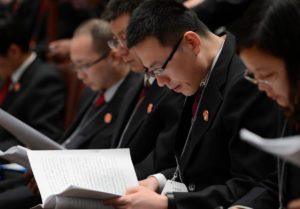 Members of China's Supreme People's Court at the Great Hall of the People in Beijing.
