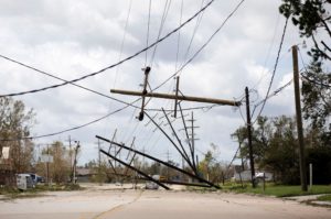 downed poles and tangled power lines