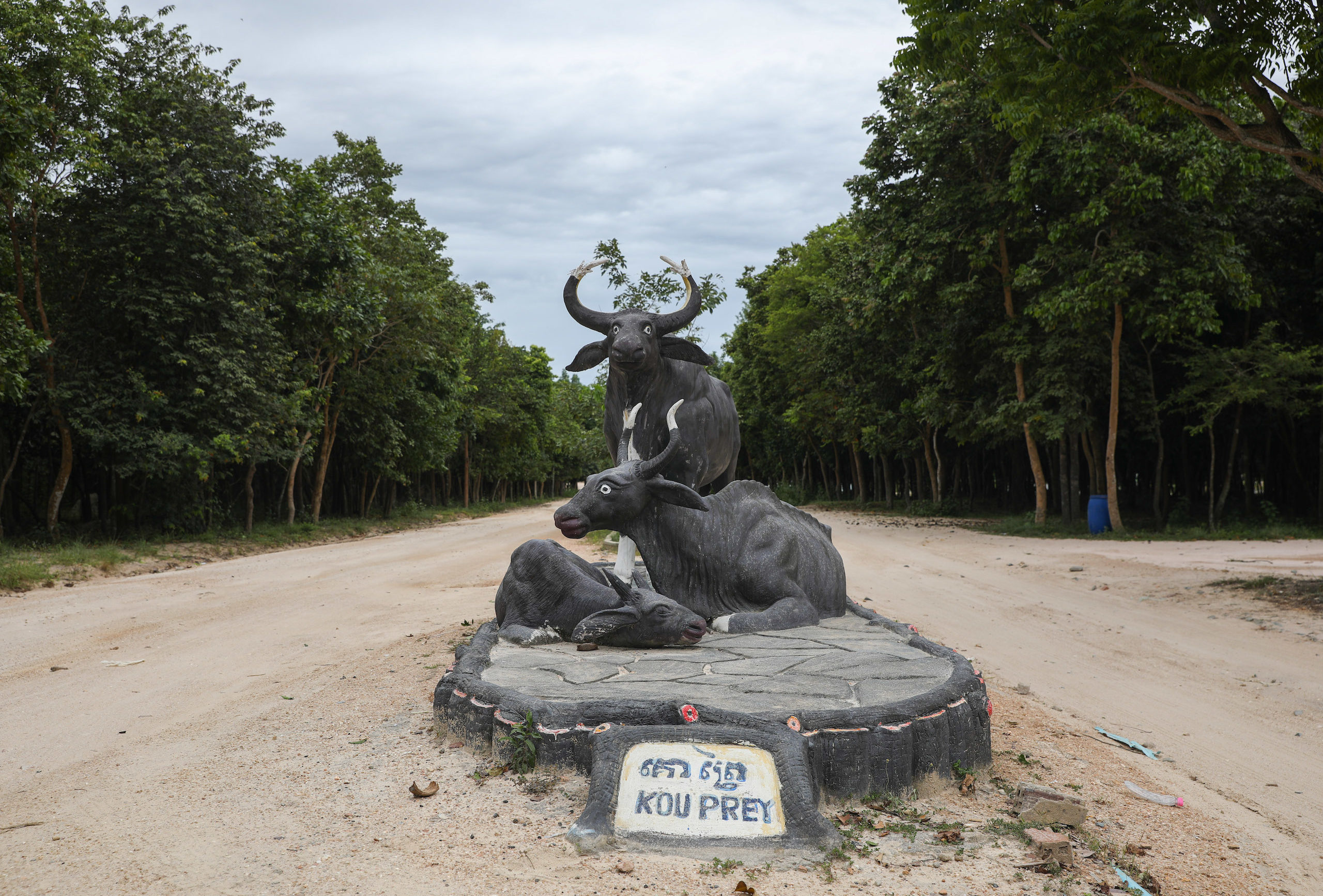 A trio of kouprey statues mark the entrance of Phnom Tamao Zoological Park and Wildlife Rescue Center