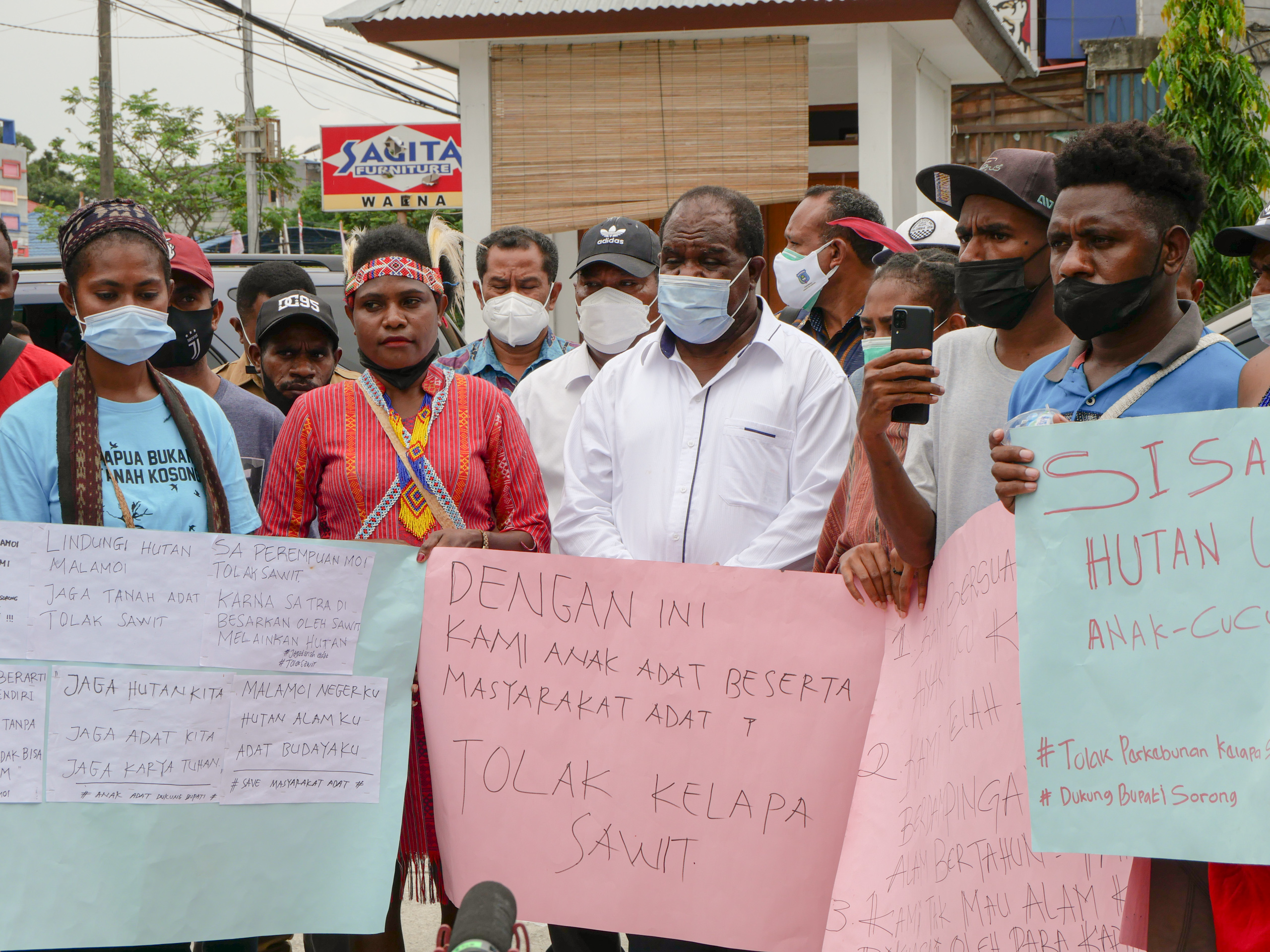 The protestors gathered in Jayapura, capital of Papua province, where the lawsuits against Johny were heard. 