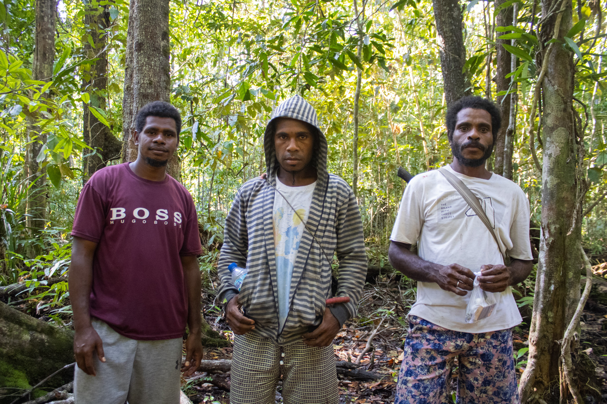 West Papua Segun hunters in forest