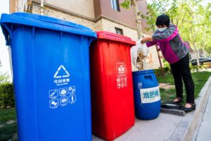 Residents put kitchen waste into composting bins in Shangdong, China