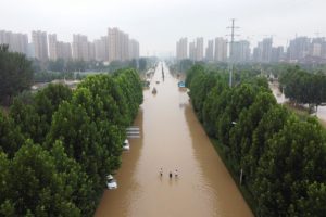 An aerial view shows a flooded road following heavy rainfall in Zhengzhou, Henan province, China July 23