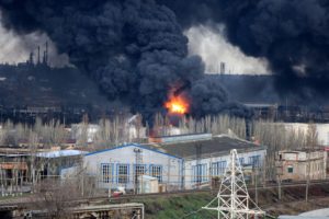 <p>An oil depot in Odesa, southern Ukraine, set alight by Russian airstrikes in April 2022. Attacks on industrial facilities can lead to leaks of hazardous substances, polluting soil, wetlands and rivers in the process. (Image: Viacheslav Onyshchenko / Alamy)</p>