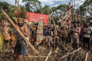 A group of indigenous gathering for a ceremony
